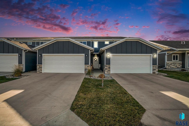 craftsman-style home with a garage