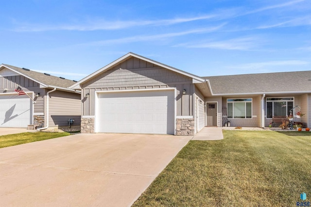 single story home with a garage and a front yard