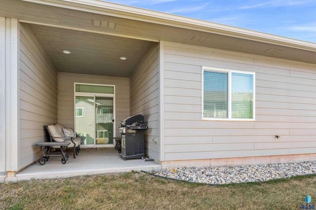 property entrance with a patio