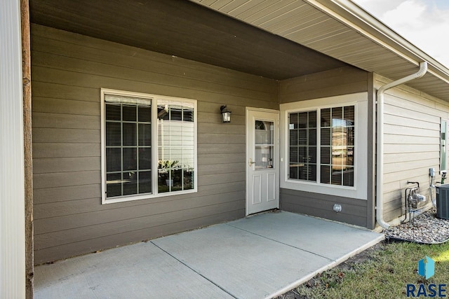 property entrance featuring a patio area