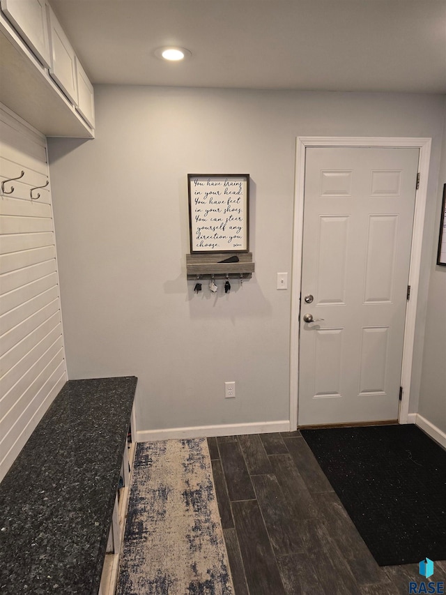 mudroom with dark hardwood / wood-style floors