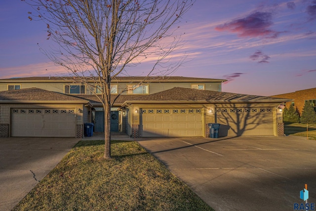 view of front of property with a garage