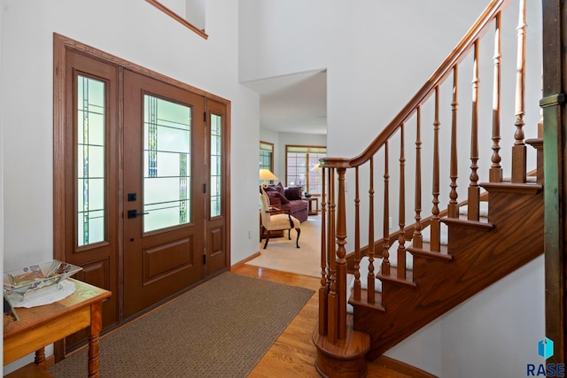 entrance foyer with light hardwood / wood-style flooring