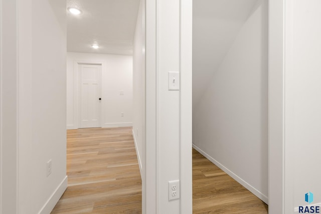 hallway featuring light hardwood / wood-style floors