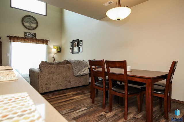 dining room featuring dark wood-type flooring