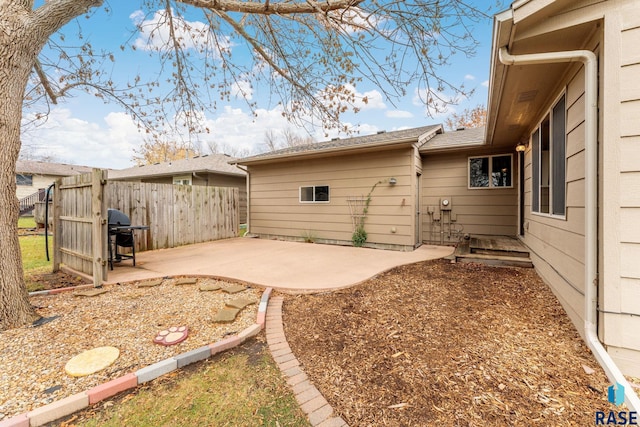 rear view of property featuring a patio area