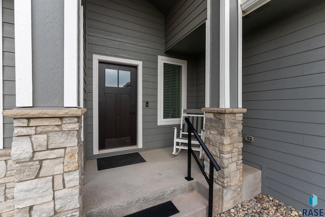 entrance to property with a porch