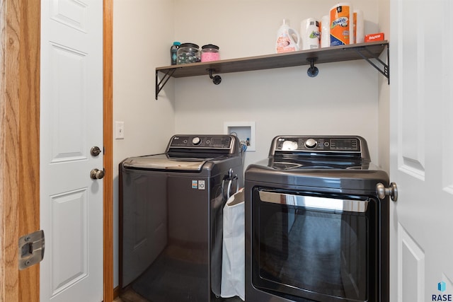 laundry area featuring washer and clothes dryer