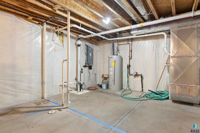 basement featuring heating unit and gas water heater