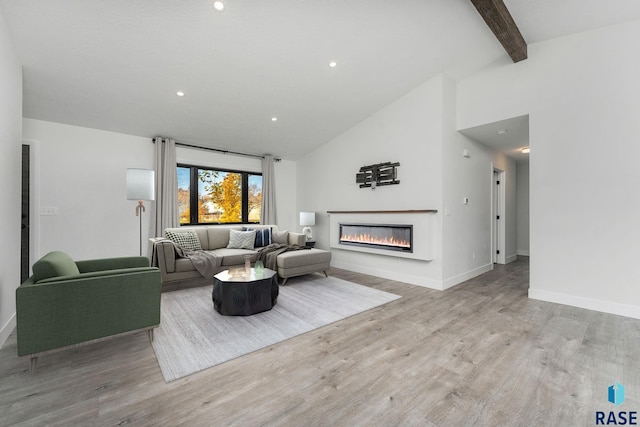 living room with beamed ceiling, high vaulted ceiling, and light wood-type flooring