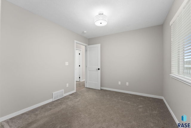 unfurnished bedroom featuring carpet floors