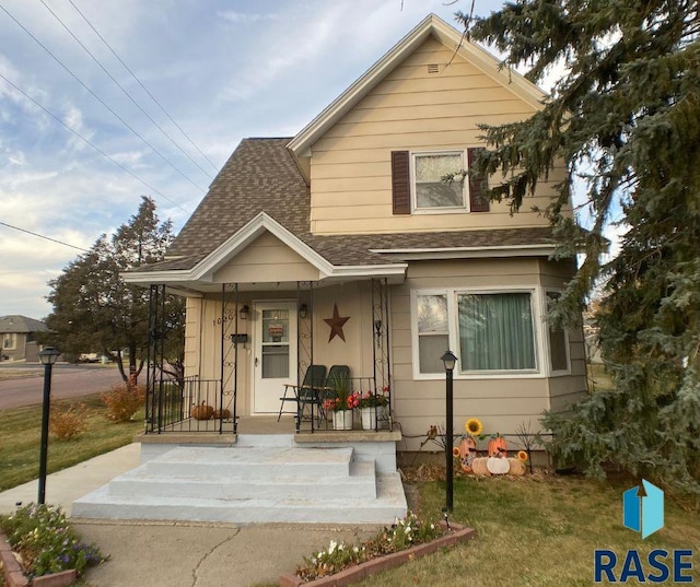 bungalow with a front yard