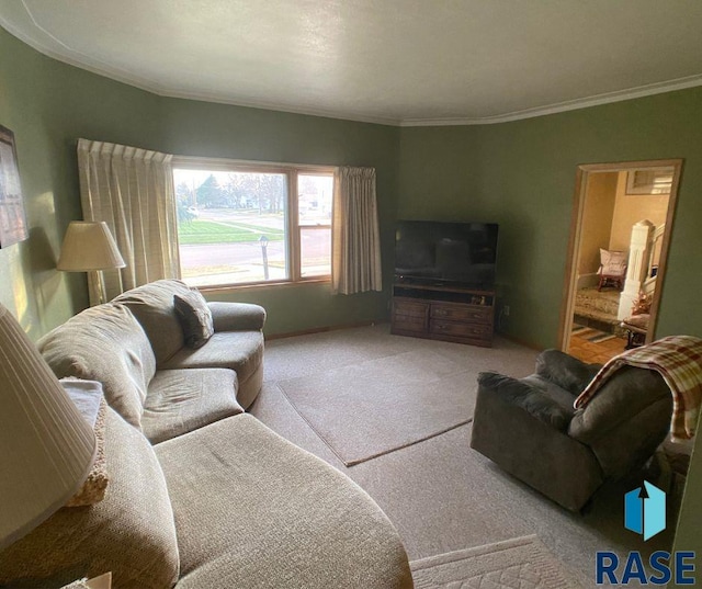 carpeted living room featuring ornamental molding