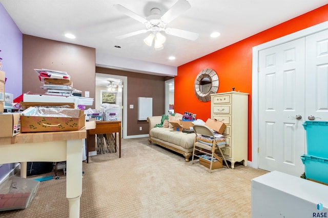 bedroom with ceiling fan and light colored carpet