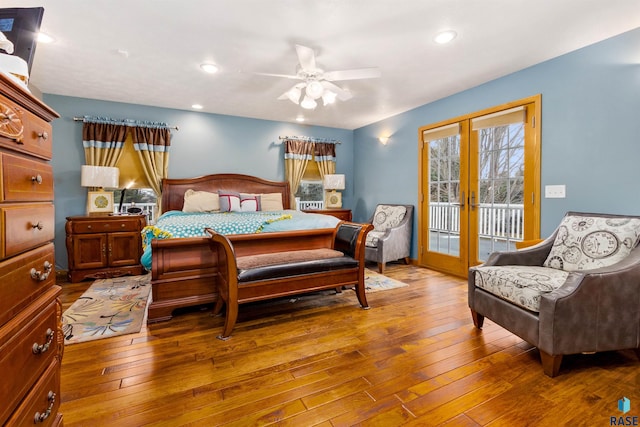 bedroom with access to exterior, ceiling fan, french doors, and hardwood / wood-style flooring