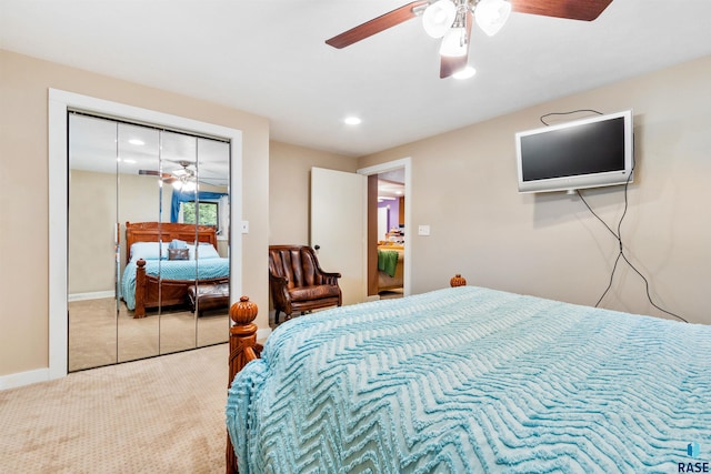 bedroom featuring carpet, ceiling fan, and a closet