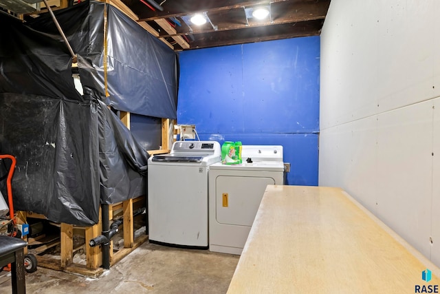 laundry area with washer and dryer