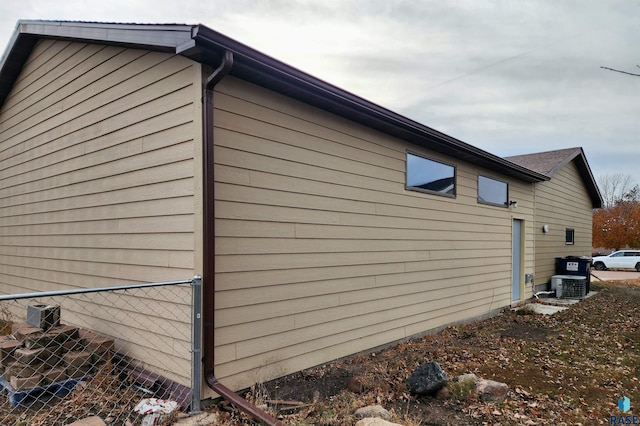 view of home's exterior featuring cooling unit