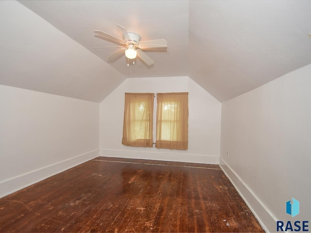 bonus room featuring ceiling fan, dark hardwood / wood-style flooring, and vaulted ceiling