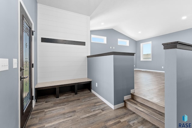 mudroom with dark hardwood / wood-style floors and vaulted ceiling