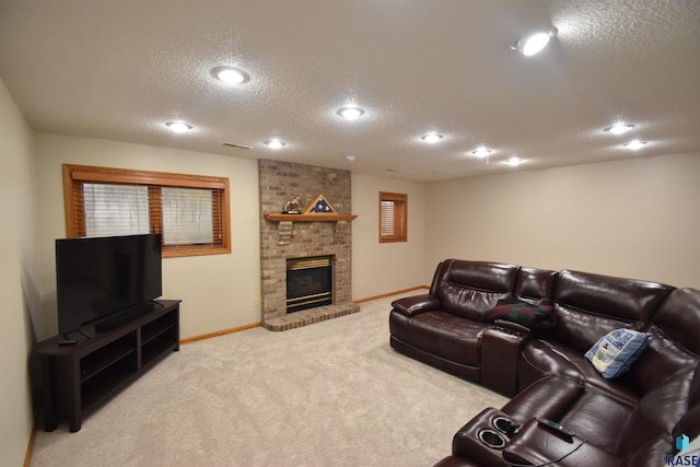 living room with carpet floors, a textured ceiling, and a brick fireplace