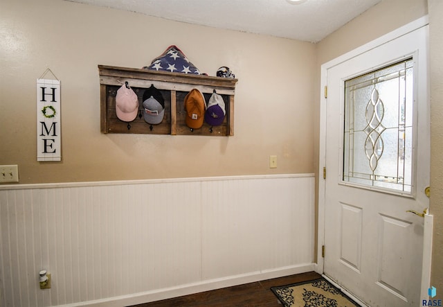 entryway with dark wood-type flooring