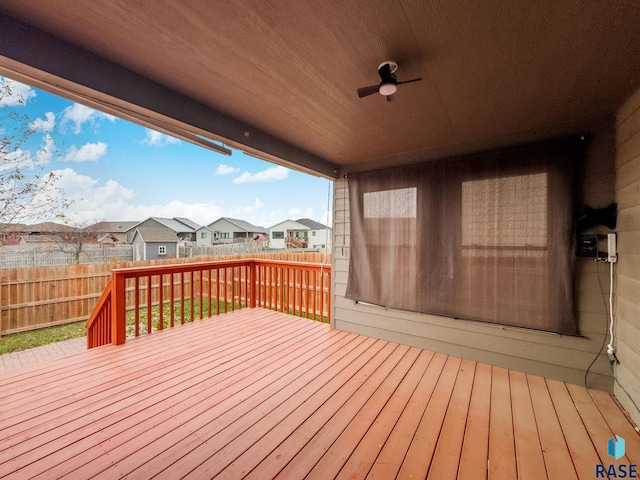 wooden deck with ceiling fan