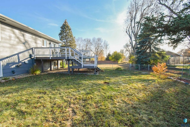 view of yard with a wooden deck