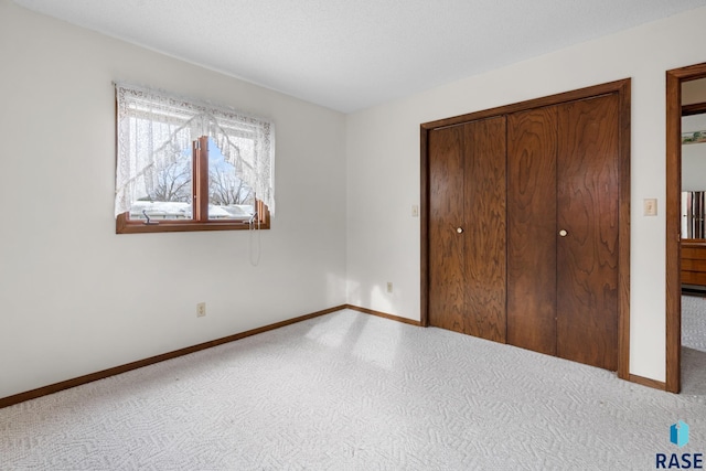 unfurnished bedroom with carpet