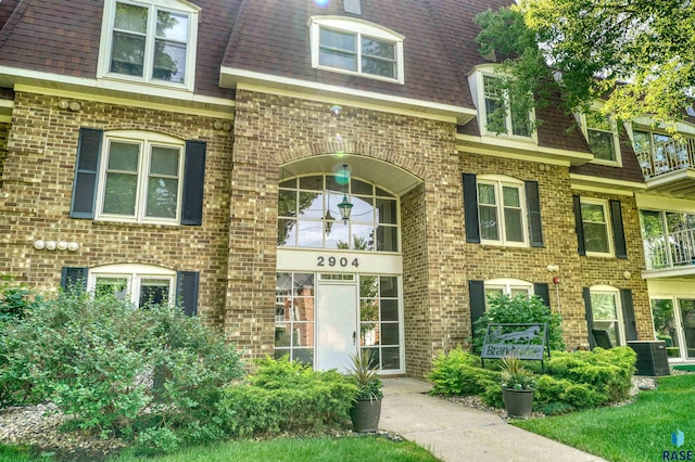 view of front of home featuring cooling unit