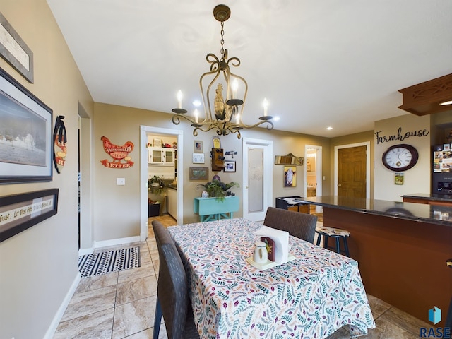 dining area featuring a chandelier