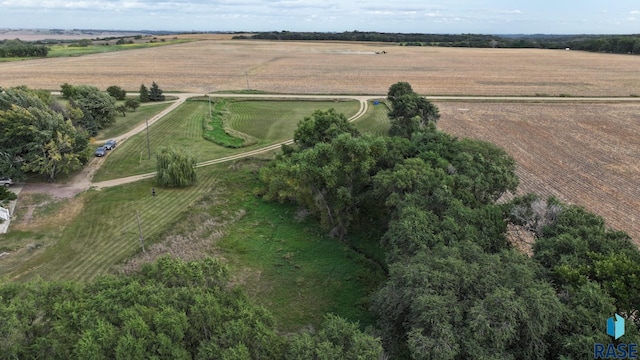 birds eye view of property with a rural view