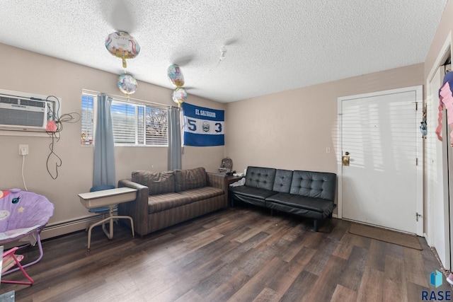 living room featuring a wall mounted air conditioner, a textured ceiling, and dark hardwood / wood-style floors