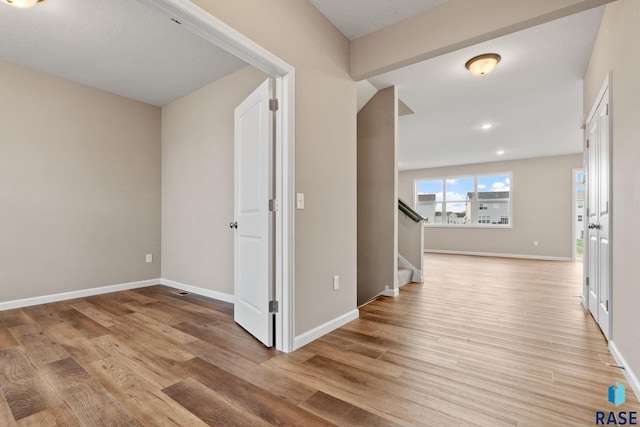 hall featuring light wood-type flooring