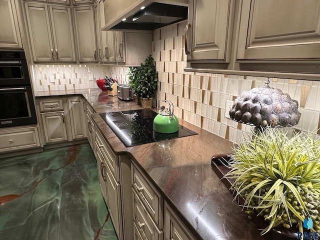 kitchen with backsplash, black electric stovetop, double oven, and custom range hood