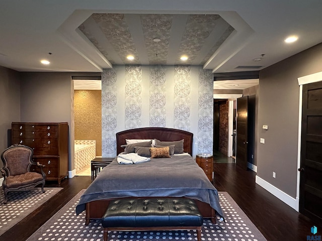 bedroom featuring dark hardwood / wood-style flooring