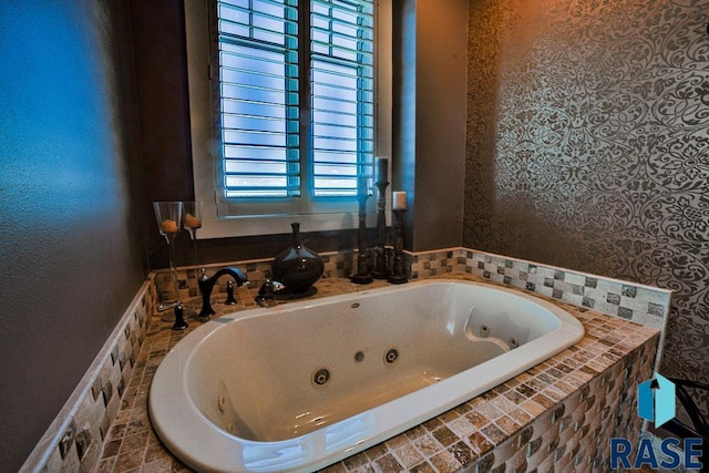 bathroom featuring tiled bath