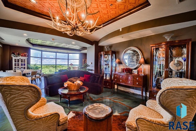 sitting room featuring a chandelier