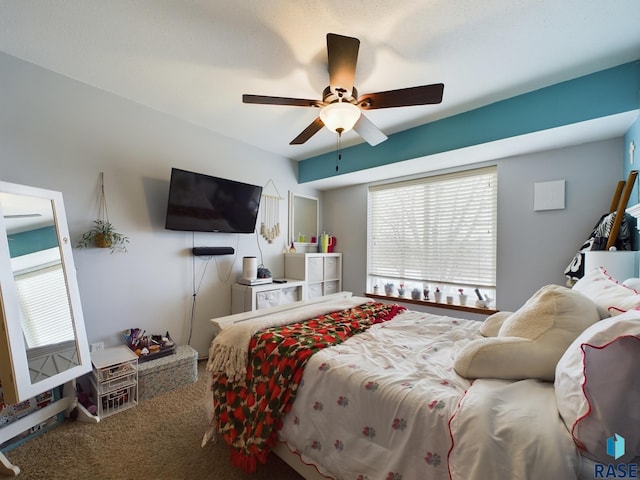 bedroom featuring carpet flooring and ceiling fan