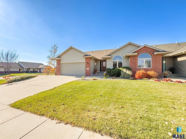 single story home with a garage and a front lawn