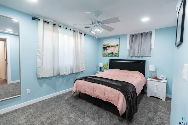 carpeted bedroom featuring ceiling fan