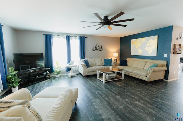 living room with ceiling fan and dark hardwood / wood-style flooring