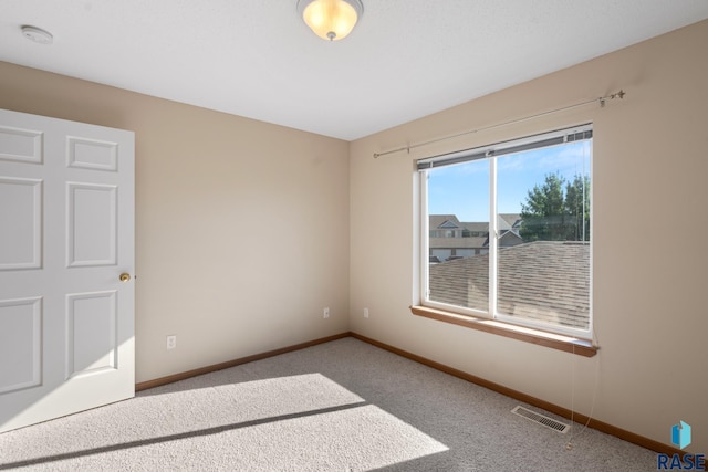 view of carpeted empty room