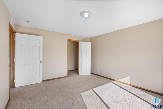 unfurnished bedroom featuring carpet floors