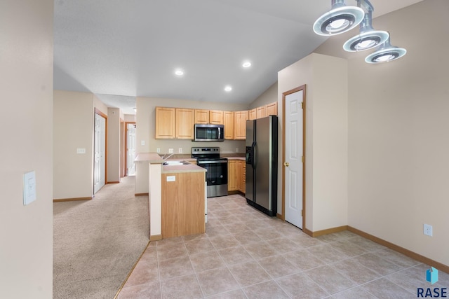 kitchen featuring light brown cabinets, sink, vaulted ceiling, a kitchen island, and stainless steel appliances