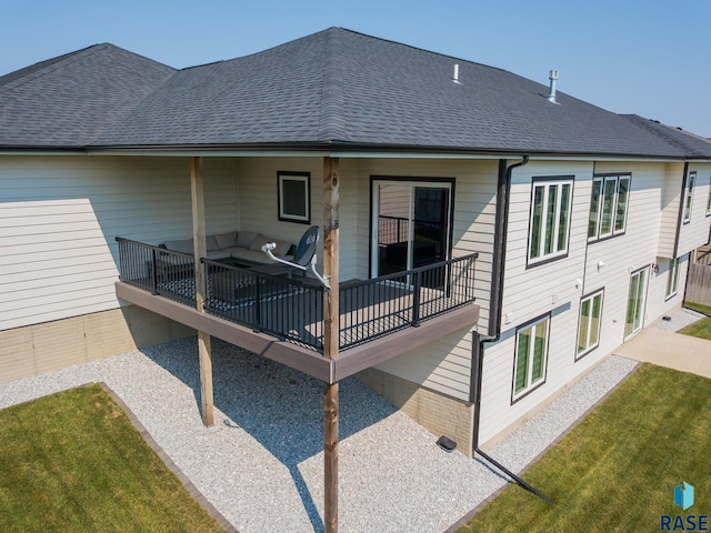 2704 S Snow Mass Ave, Sioux Falls, SD 57110 - back of house with a shingled roof and a wooden deck