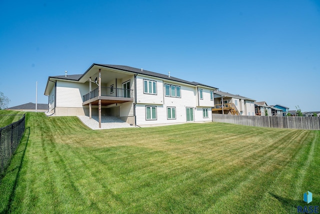 2704 S Snow Mass Ave, Sioux Falls, SD 57110 - back of property with a balcony and a residential view