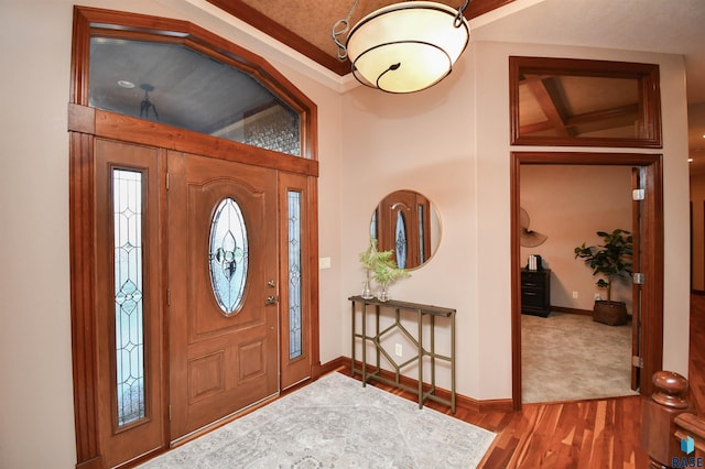 foyer with hardwood / wood-style floors