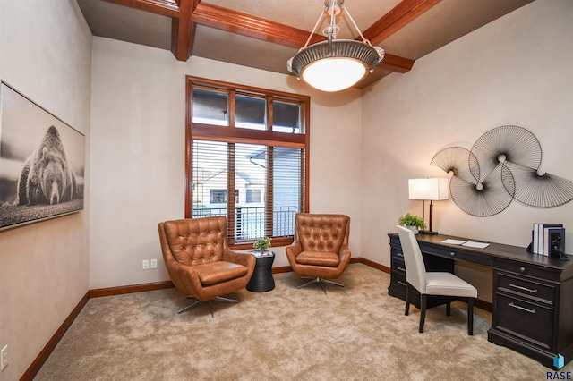 office space featuring beamed ceiling and light carpet