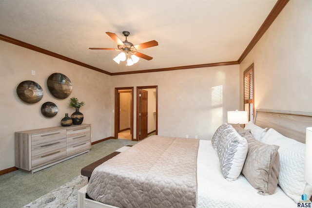 carpeted bedroom with ceiling fan and crown molding